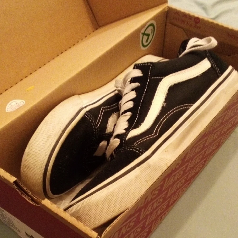 Vans Kids Black and White Sneakers